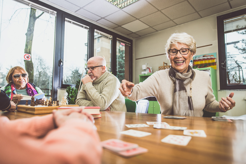 Seniors playing games at independent or assisted living community in Kelowna