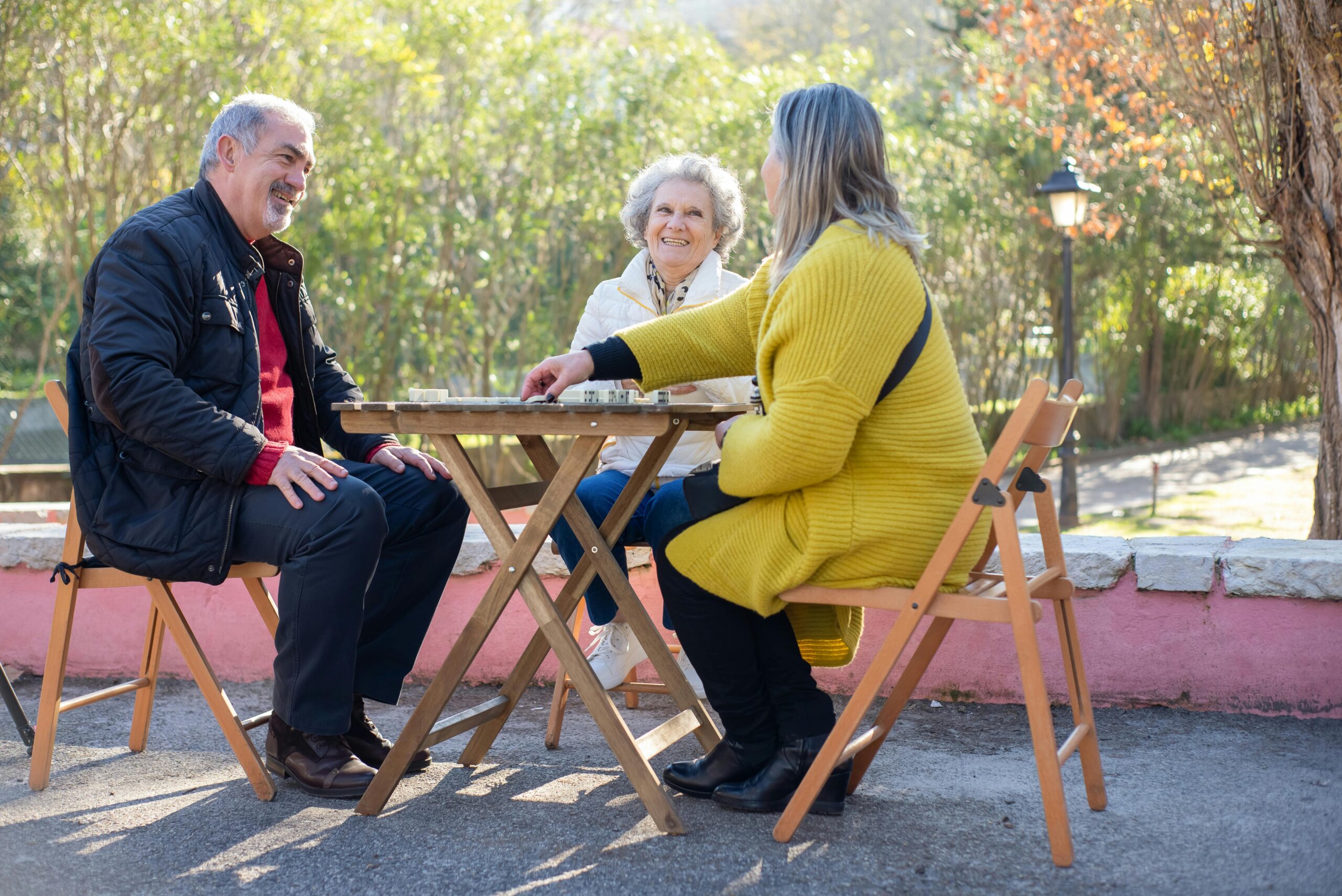seniors outside playing game